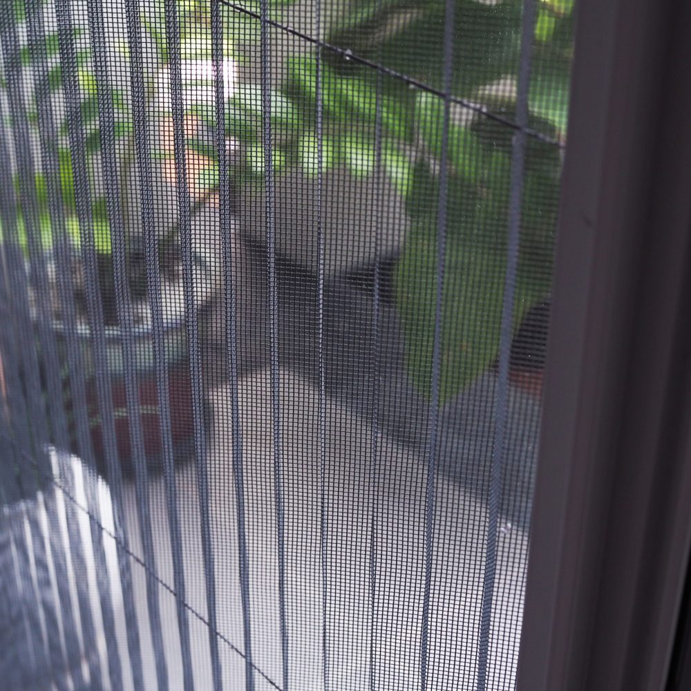 door with mosquito netting screen against wire mosquitoes and prevent insects.