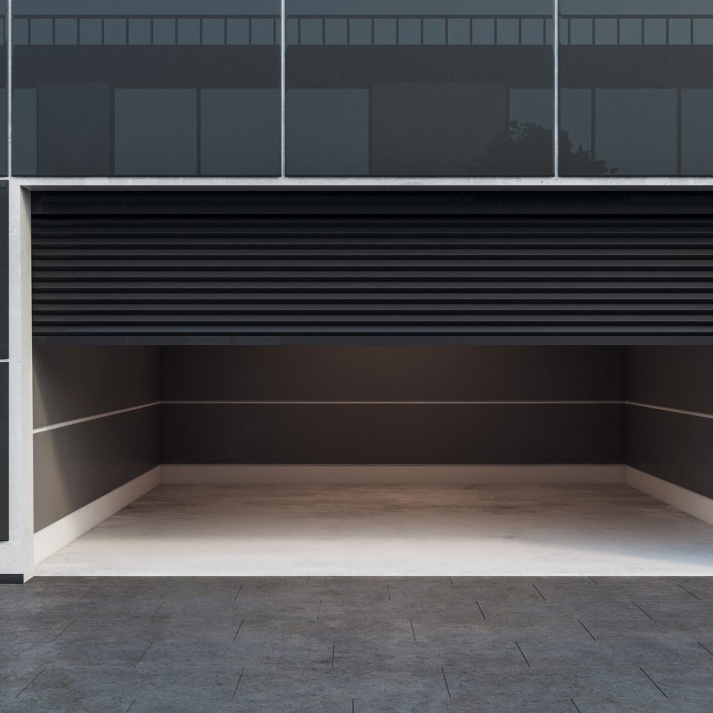 Front view of empty garage interior with camera and copy space. 3D Rendering